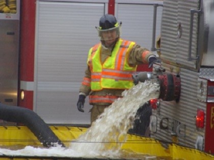 Fireman Releasing Water